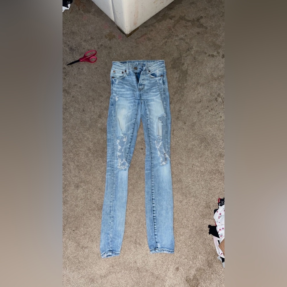 american dangle ripped jeans